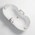 Freestanding acrylic soaking tub with chrome fixtures and anti-slip design